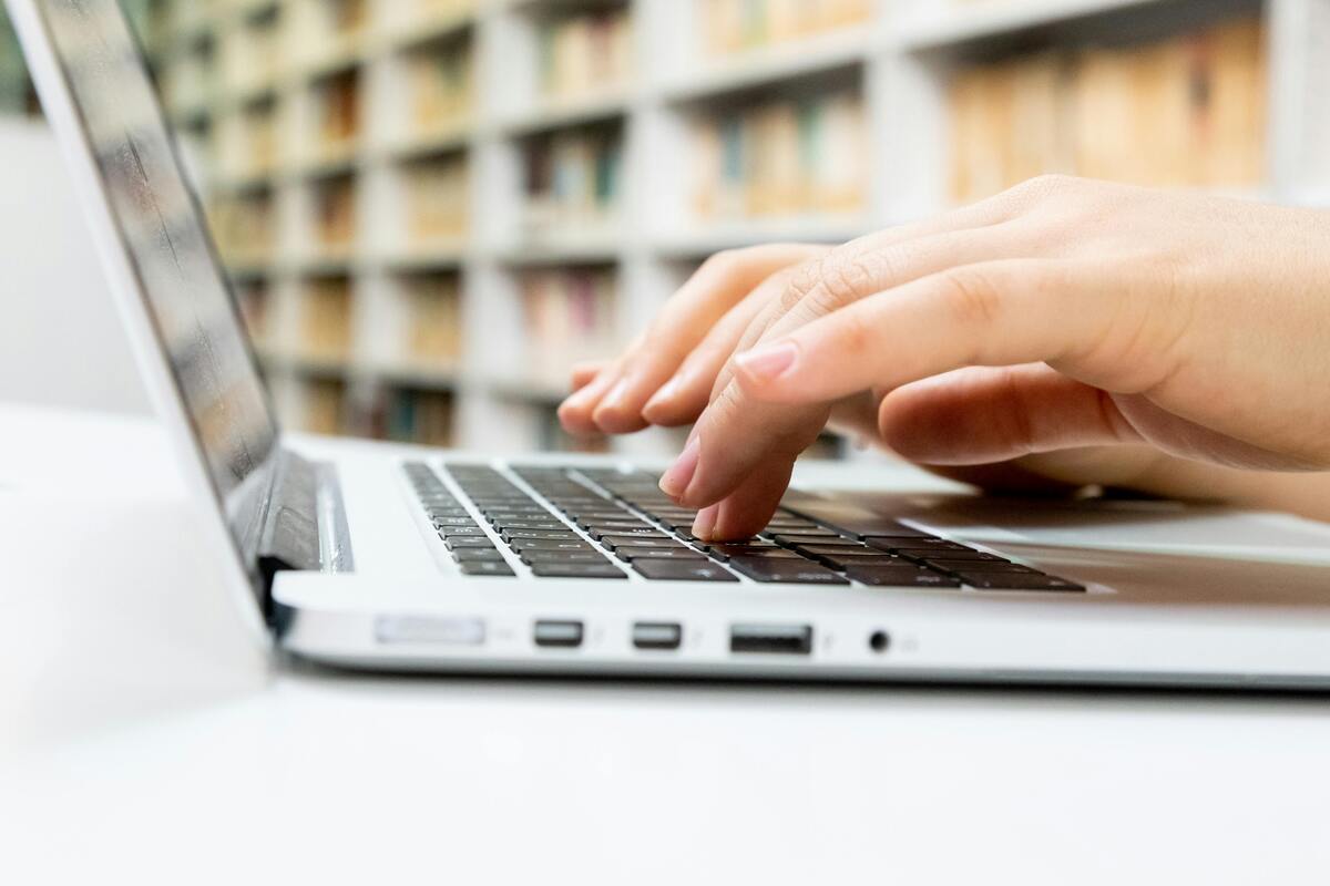 typing on a laptop, best font for cv