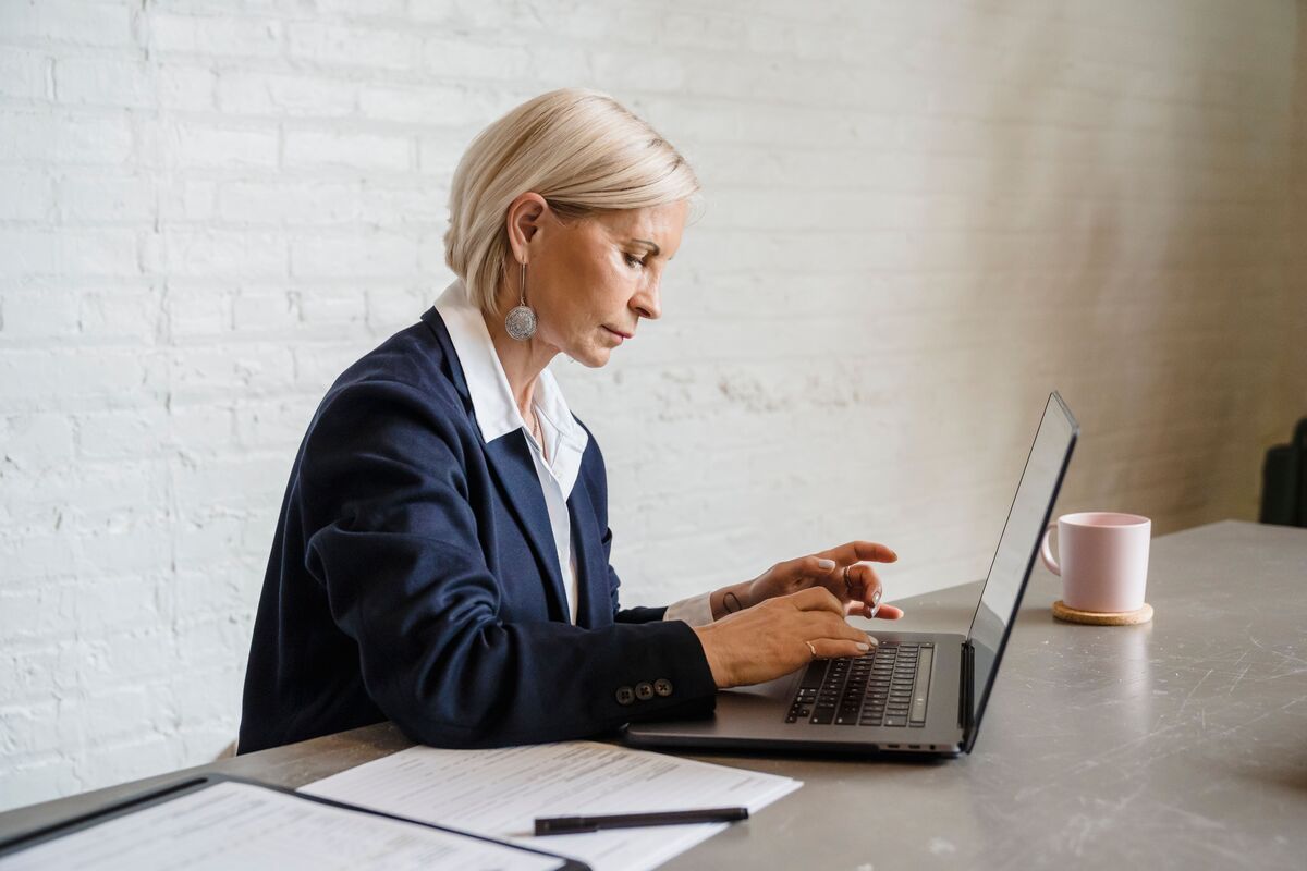 professional businesswoman sitting with a laptop