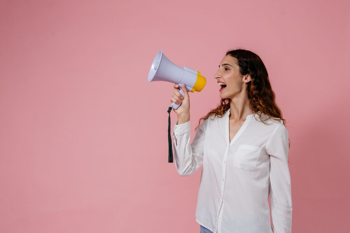 woman shouting into a megaphone, personal statement