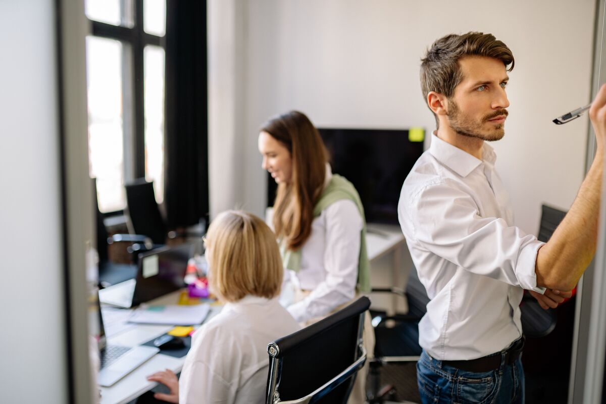 three people in an office, roles and responsibilities